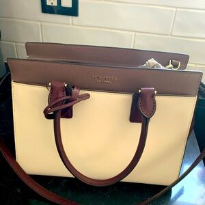 Kate Spade purse. Brand new, never used. Tan and brown colour.